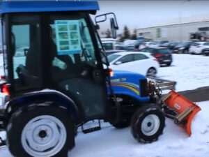 Snowplough with plate for tractor
