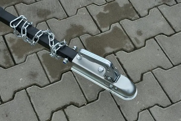 Smalcinātāja sakabes sistēma